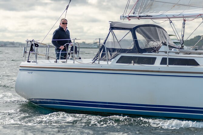 Guided Seattle Sailing Adventure from Bainbridge Island - Raising the sails in Puget Sound