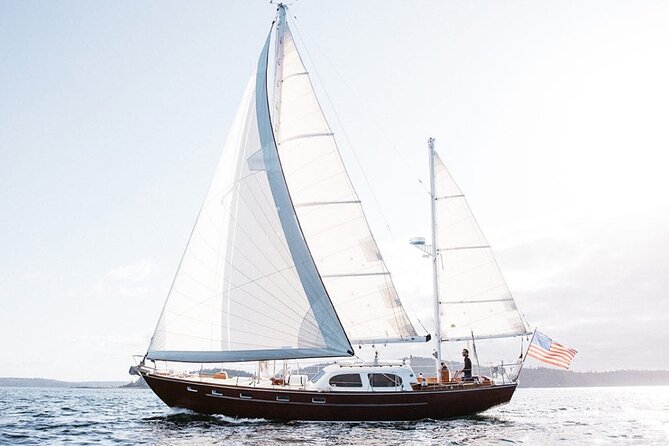Sail Bainbridge Island & Seattle Waters - Luxury Classic Sailboat - Taking the wheel or letting the captain handle it