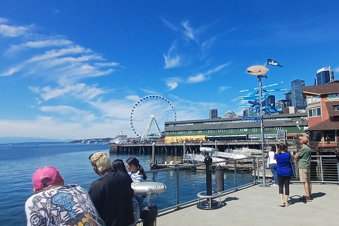 Seattle Waterfront Electric Scooter Tour with Great Wheel - Returning south through Pioneer Square