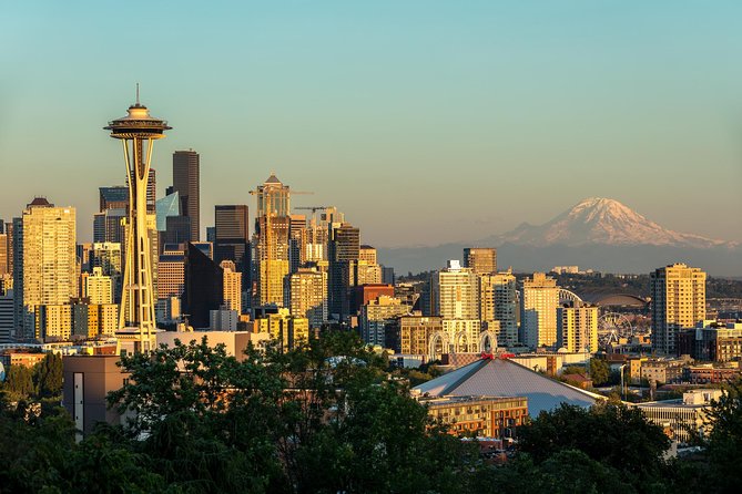 Downtown Seattle at dusk with Mount Rainier behind the skyline